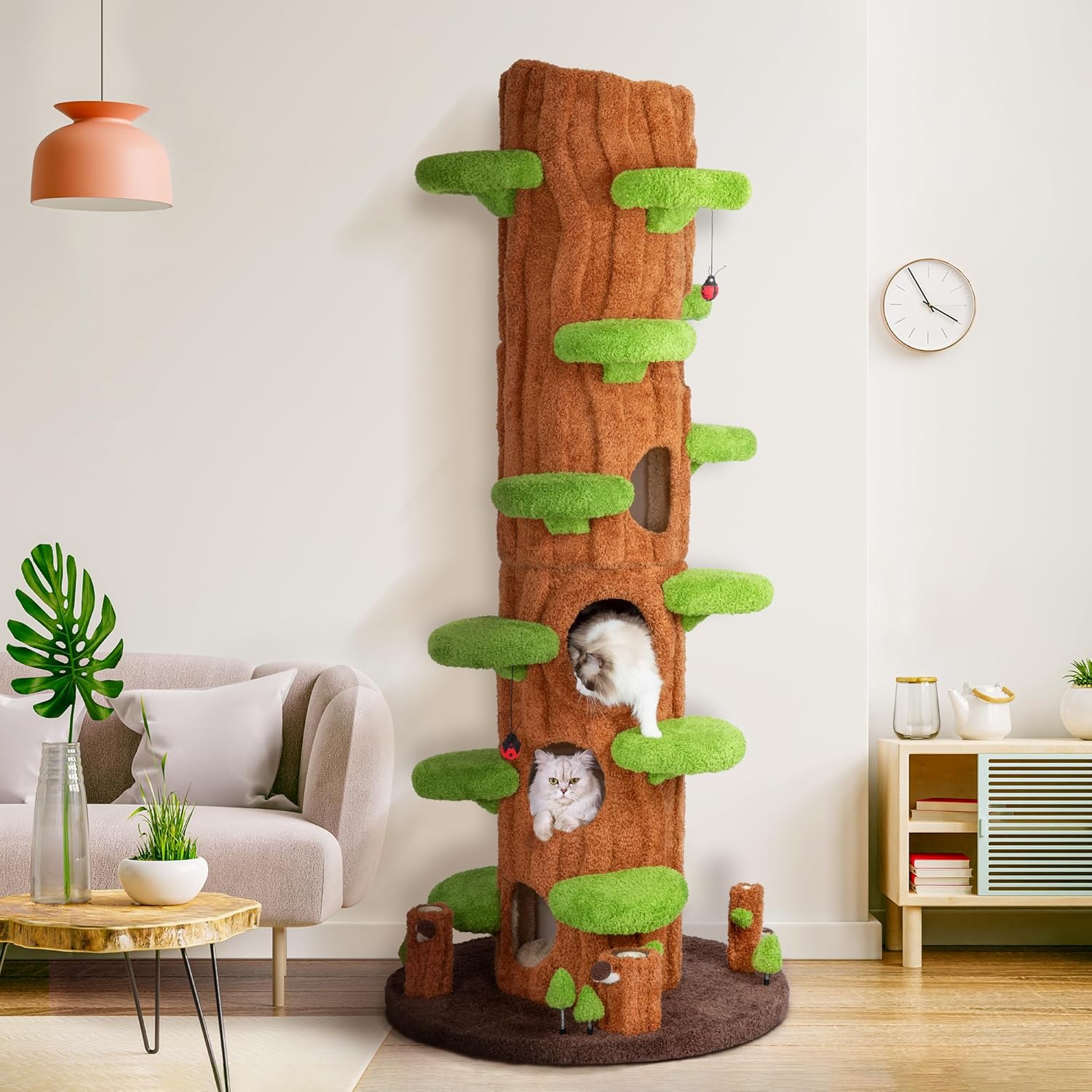 Green tall cat tree tower with plush cushioned platforms, scratching board, and perches for indoor cats — view 1