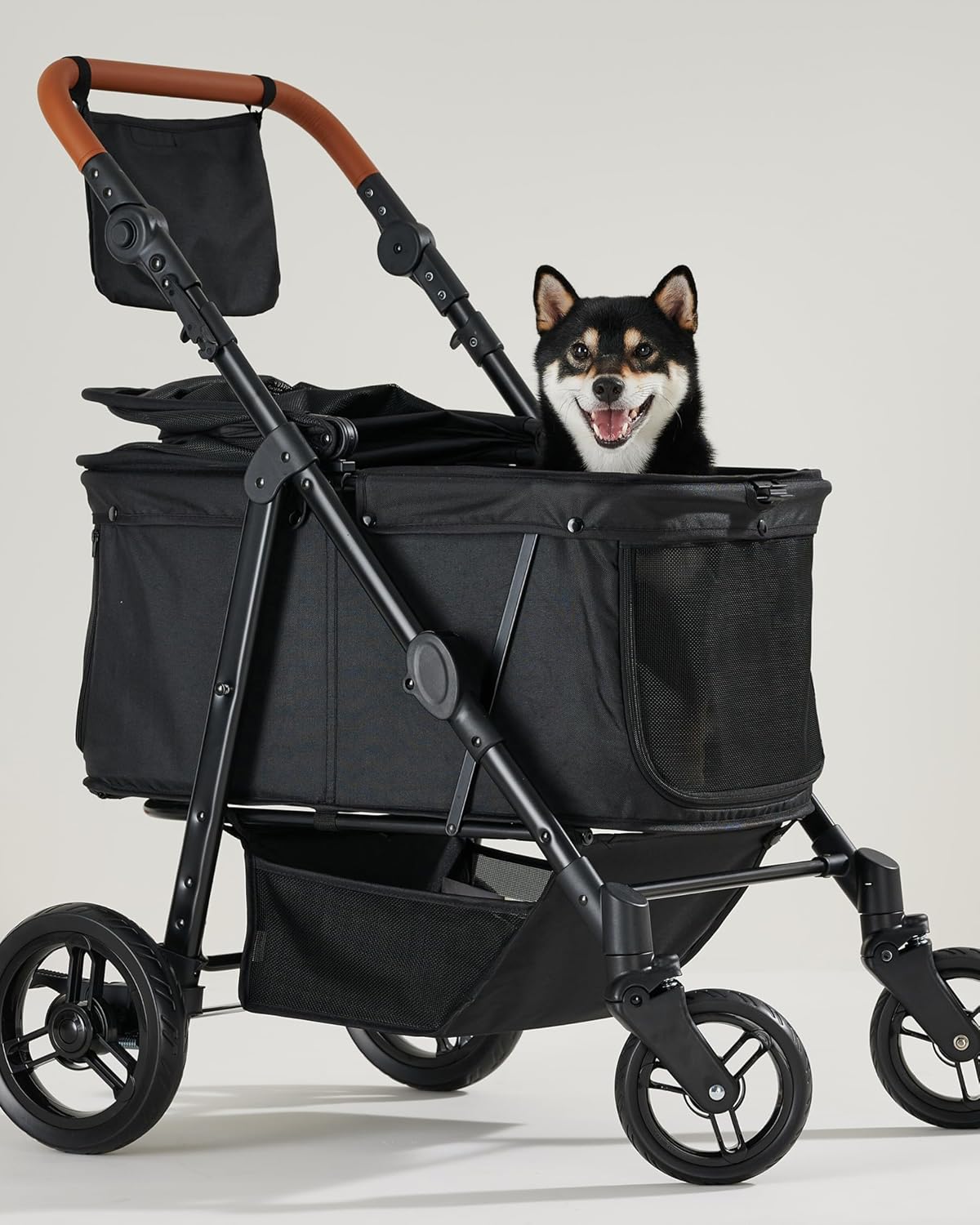 All-terrain dog stroller in gray with waterproof Oxford fiber, adjustable canopy, and storage organizer for large dogs — front