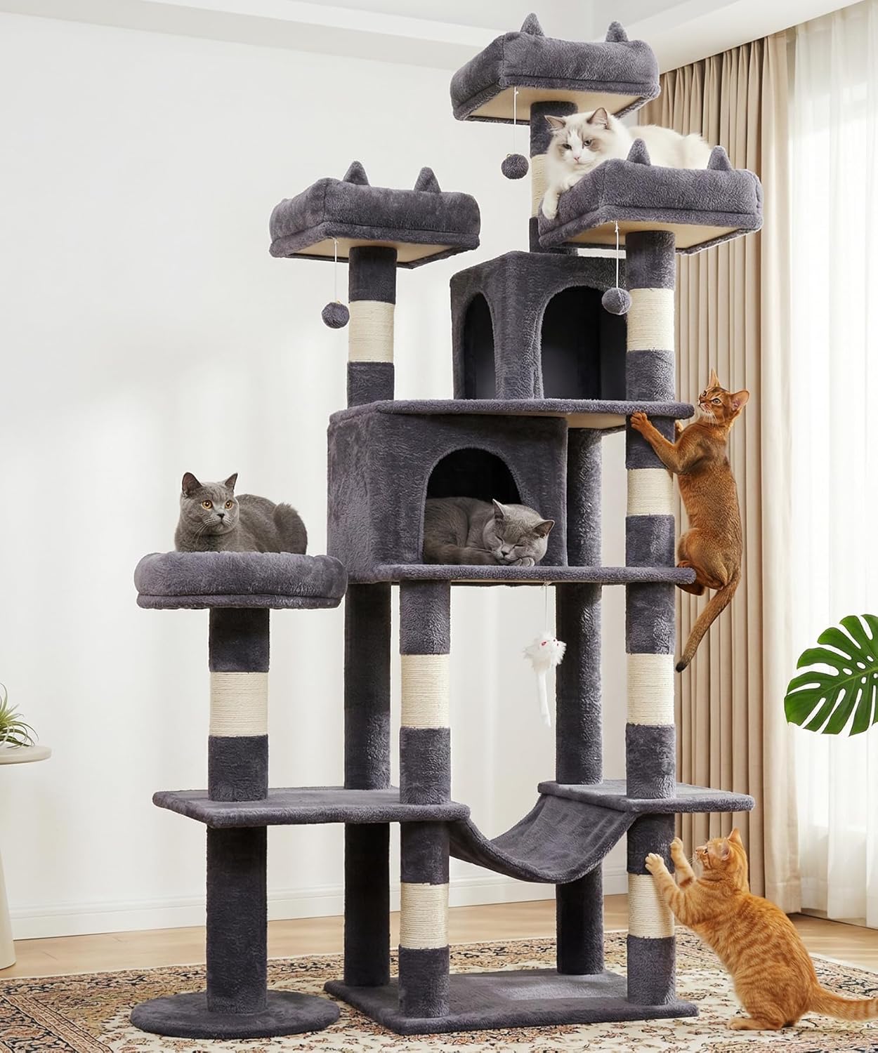 Dark grey 71-inch cat tree tower with sisal rope scratching posts, plush hammock, and multiple levels for climbing and rest — front