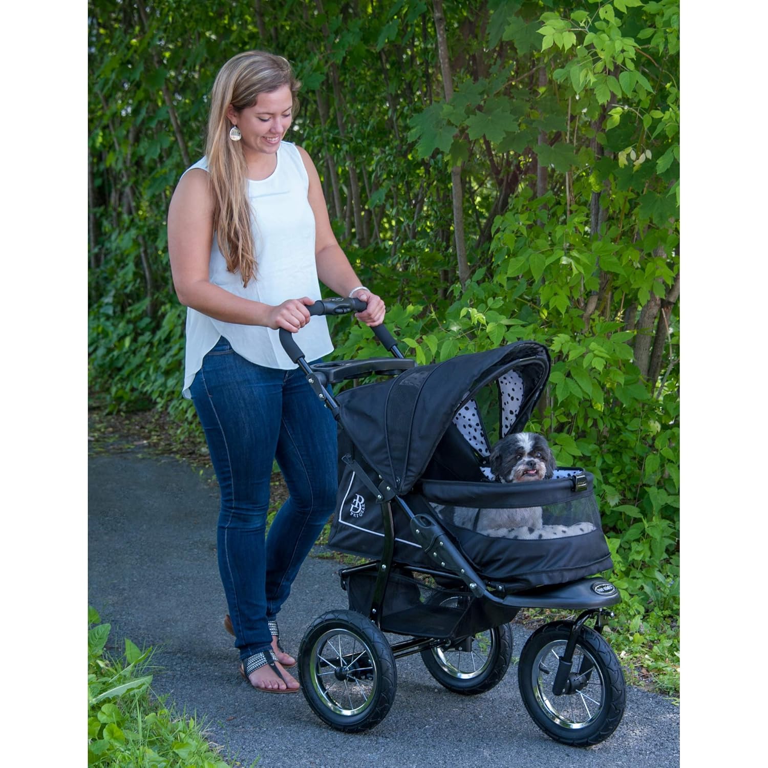 Caribbean blue pet stroller with zipperless mesh entry and gel-filled tires, showing plush pad and one-hand fold design โ view 2
