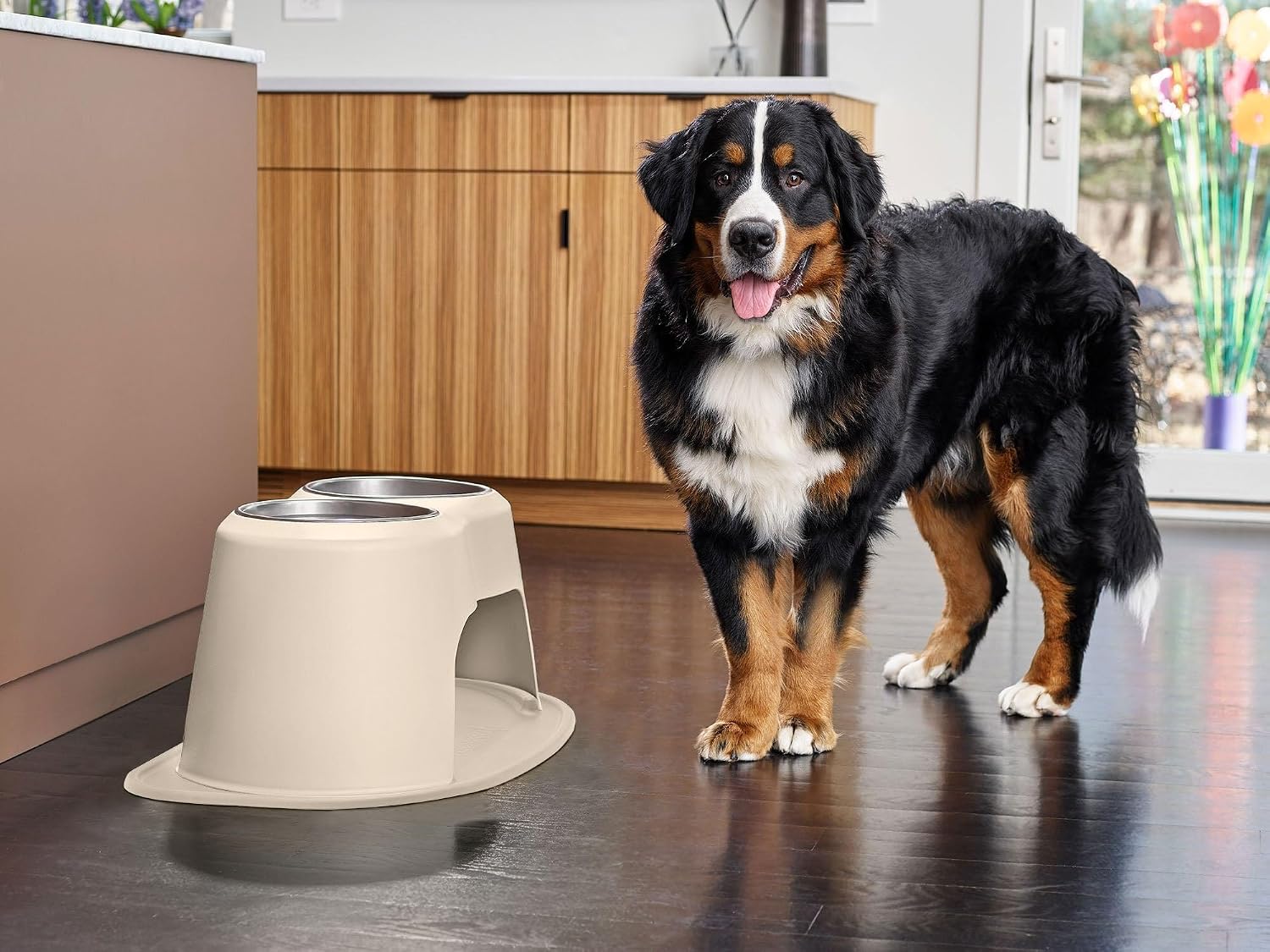 Dark grey elevated dog and cat feeding system with stainless steel bowls, 12 inch high ergonomic design — side